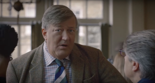 Stephen Fry educating tourists on British culture