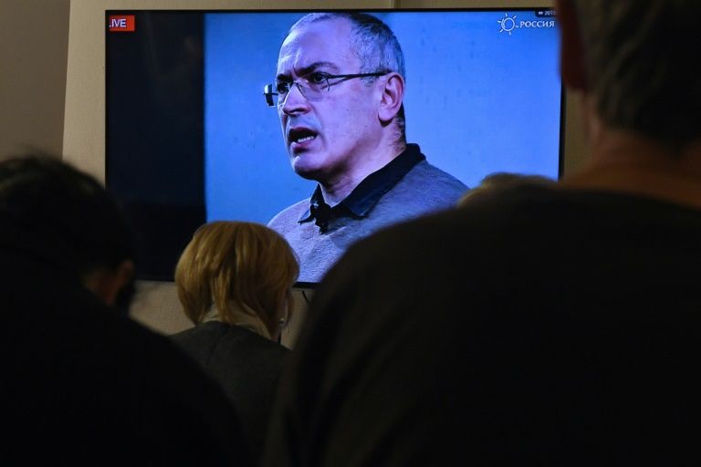 Armed police raid offices of Putin critic Mikhail Khodorkovsky in Moscow